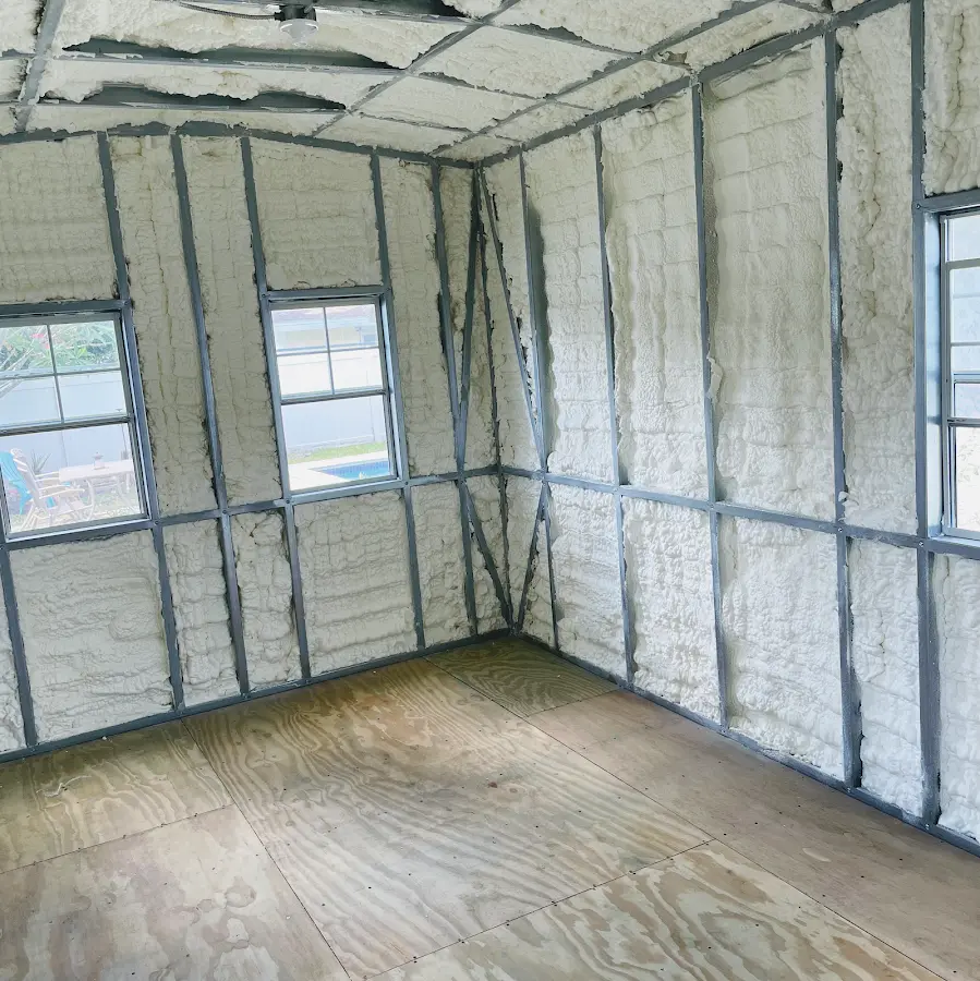 Closed-cell spray foam insulation applied to wall cavities in a residential project in Elkhart